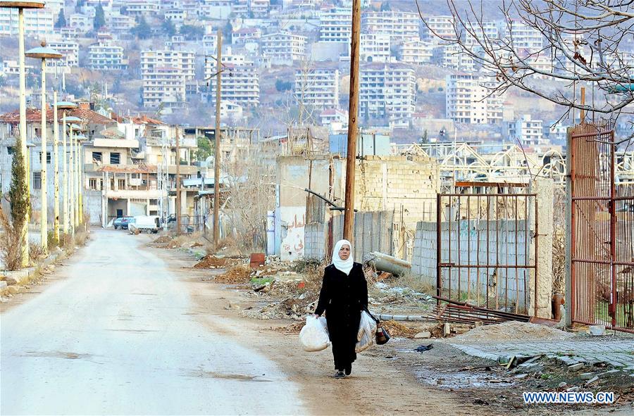 SYRIA-ZABADANI-WAR-RAVAGED CITY-FAMILIES-RETURNING