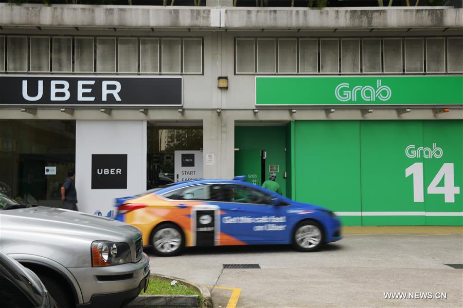 SINGAPORE-UBER-GRAB ACQUISITION