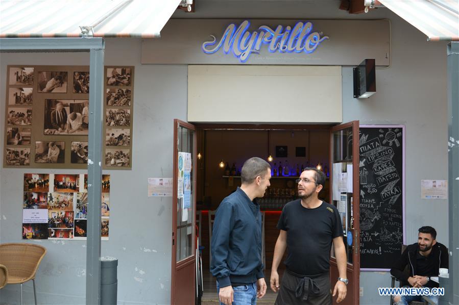 GREECE-ATHENS-CAFE-PEOPLE WITH DISABILITIES