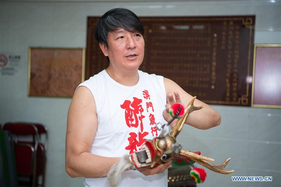 CHINA-MACAO-FISHMONGER-TRADITIONAL DRUNKEN DRAGON DANCE (CN)