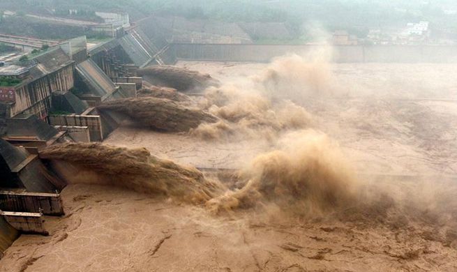 Water gushes out from Xiaolangdi Reservoir on Yellow River